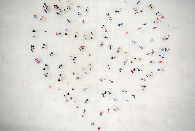 People standing in heart formation